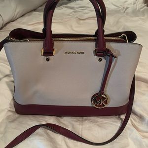 Michael Kors beige and maroon purse with shoulder strap. Perfect condition.